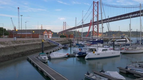 Pan across Tagus Bridge to Docas in Lisbon Stock Footage 118806311