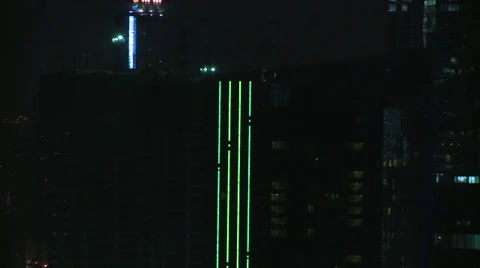 Pan across tower blocks a night Stock Footage 37887802