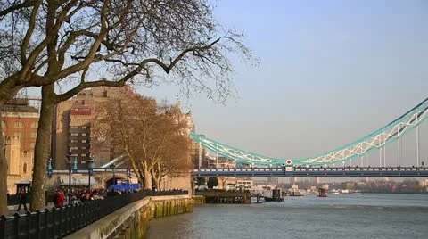 Pan across Tower Bridge fast Stock Footage 22016007