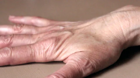Pan Across Wrinkled Hands Stock Footage 37961450