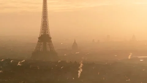 Pan up aerial shot towards the Eiffel tower at sunrise Stock Footage 291624275