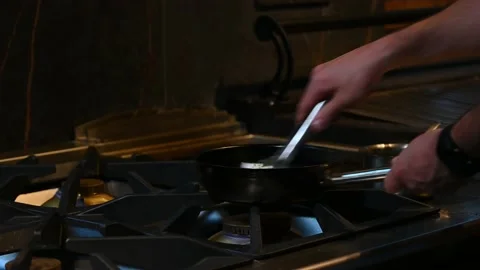 Pan alone warming up on fire Video stock 132530809