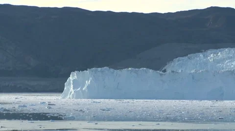 Pan along stunning glacier front in Greenland during the blue hour Stock Footage 59997883