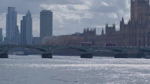 Pan along Thames and Westminster Bridge Stock Footage 331746562
