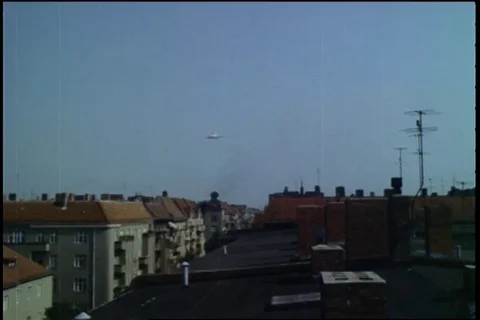 Pan American DC-6 and C-54 come in over apartments and landing singly - 1961 Stock Footage 101166802