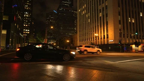 Pan Up and Down A Man Crosses Street Stock Footage 105250339