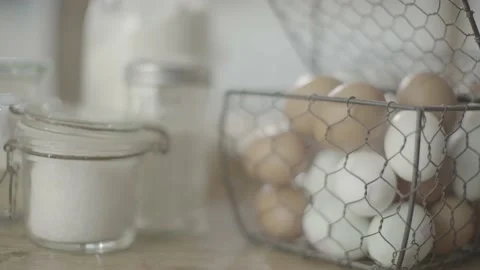 Pan and Pull Focus of Egg Basket in Kitchen Stock Footage 158927986