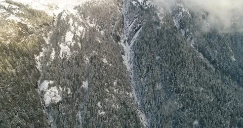 Pan And Reverse Down mountain Stock Footage 91461737