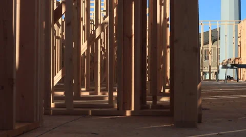 PAN UP AND SIDE OF A BUILDING CONSTRUCTION ZONE Stock Footage 33756240