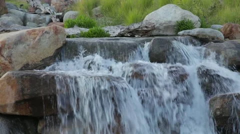 Pan and tilt of a waterfall. Stock Footage 64217570