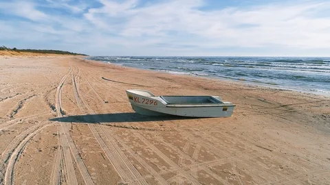 Pan Around Boat on the Beach Stock Footage 90048487