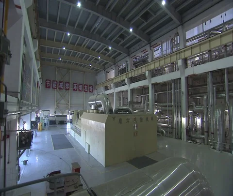 Pan around cavernous interior of Shenhua Sanhe power station. Stock Footage 86746025