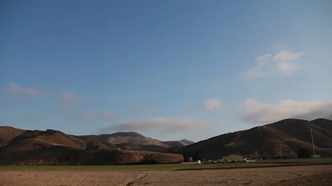 Pan around mountains and fields Stock Footage 109171522