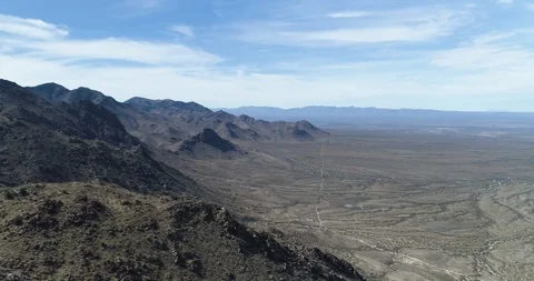 Pan around from mountains to busy Interstate 10 in southern USA drone aerial 4K Stock Footage 111314897