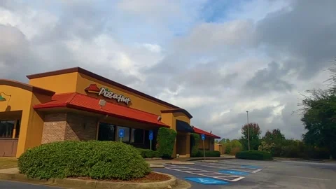 Pan around a Pizza Hut Stock Footage 142969077