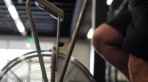 Pan of Athlete on Exercise Bike Stock Footage 41266497