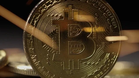 Pan away from bitcoin with sparks Stock Footage 84100503