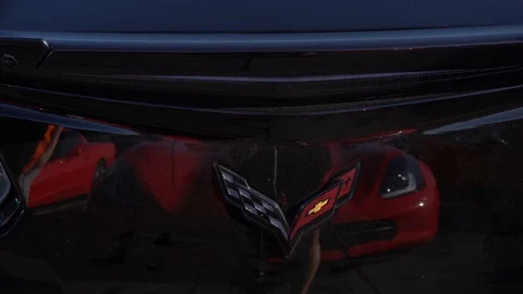 Pan of the back of a super car, showing off elegant curves and Stock-Footage 122617640