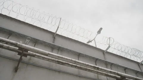 Pan barb wire Lepoglava prison croatia Stock Footage 245144057