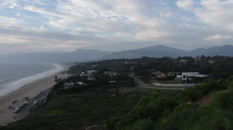 Pan from Beach to Sunset over the Ocean 動画素材 46667702