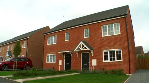 Pan from Blue Cloudy Sky to House Stock Footage 35596810
