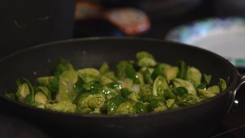 Pan of brussel sprouts being cooked for a holiday meal Stock Footage 97532653