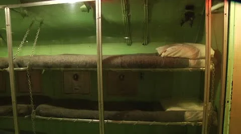 Pan of bunks in WWII submarine Stock Footage 8912032