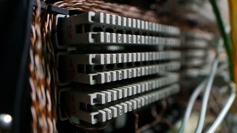 Pan from buttons to cables of a network connector Stock Footage 94378963
