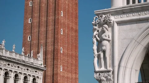 Pan up Campanile clock tower, St Marks Square, Venice, Italy Stock Footage 83288354