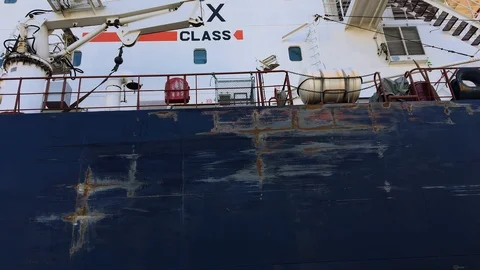 Pan of Cargo Ship Passing Thru Lock 1 of Welland Canal While Men &amp; Boys Watch Stock Footage 91635919