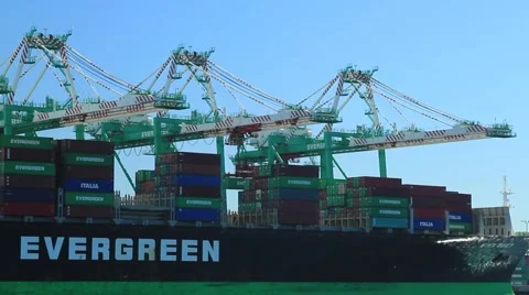 PAN OF CARGO SHIP AT PORT Stock Footage 913286