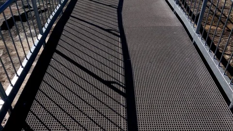 Pan up catwalk in forest. Stock Footage 99614454