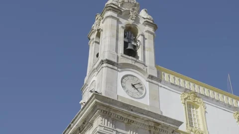 Pan Up to Clock Tower of Igreja do Carmo, Faro Stock Footage 332903004