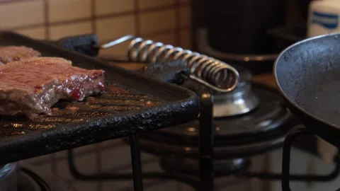 Pan close up grilled meat on the grill Stock Footage 130267424