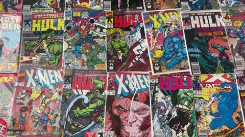 Pan of comic books Stock Footage 231647727