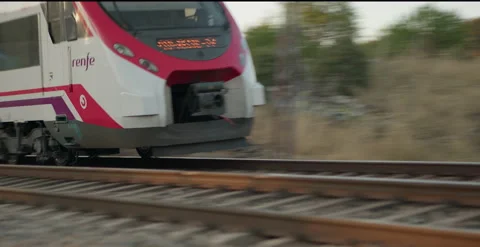 Pan  Commuter Train passes  by Wide Angle Stock Footage 204159952