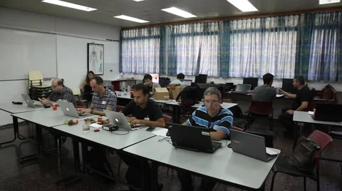Pan Computer programmers during hackathon Stock Footage 50914613