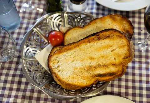 Pan con tomate - grilled bread topped with mixture of grated tomatoes with salt Stock Photos