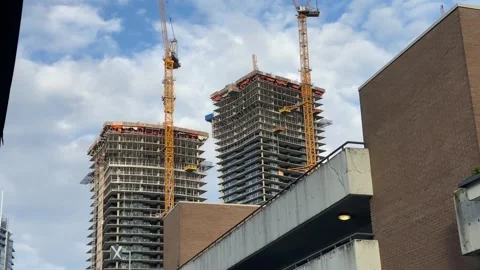 Pan Construction cranes condos metropolitan residential Stock Footage 319372540