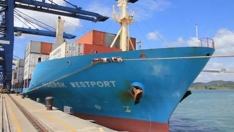 Pan of Container Ship and Shipping Yard (HD) co Stock Footage 1217336