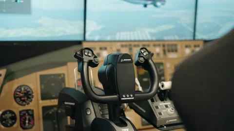 Pan to Control Panel Inside Museum Flight Simulator Stock Footage 337414303