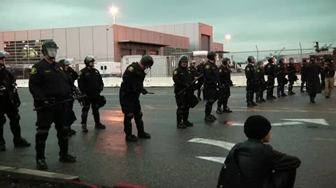 Pan with Cops and Protesters Stock Footage 10565858