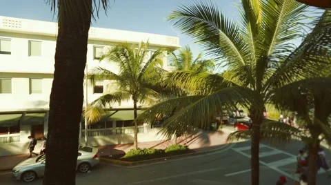 Pan of a corner in South Beach, Miami during the day. 動画素材 46861865