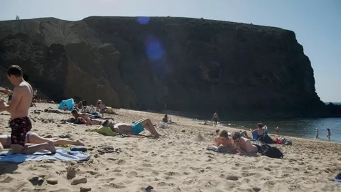 Pan Crowded Beach Stock Footage 102139733