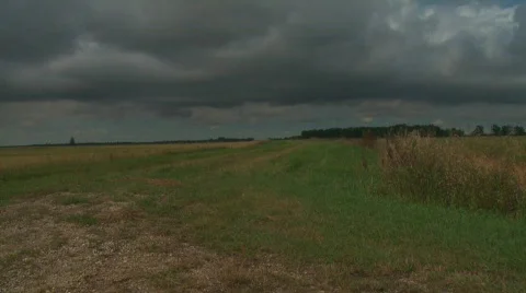 Pan From Dark Clouds to Bright Sky and Road Ahead Stock Footage 663406