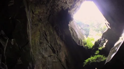 Pan from darkness to light in an amazing cave 2 Stock Footage 41755400