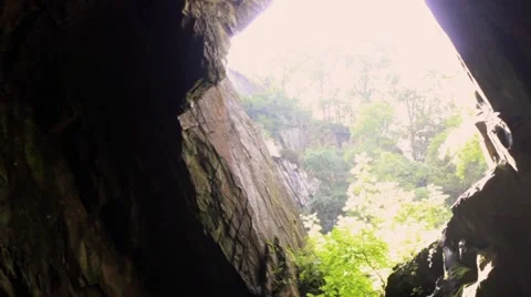 Pan from darkness to light in an amazing cave Stock Footage 41755803