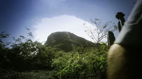 Pan de azucar man passing Stock Footage 10810225