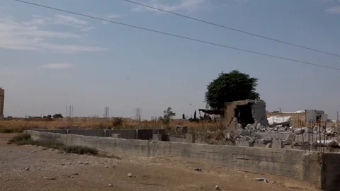 Pan of Destroyed Buildings co Stock Footage 120924694