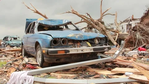 Pan of Destroyed Car and House After Tornado (HD) c Stock Footage